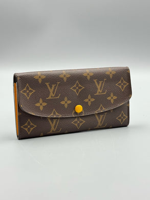 Louis Vuitton Emilie monogram wallet with yellow