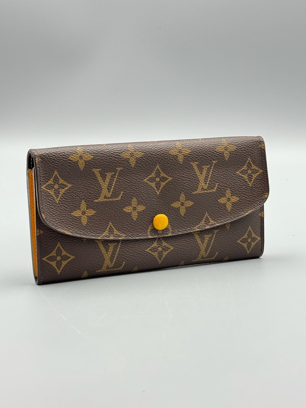 Louis Vuitton Emilie monogram wallet with yellow