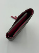 Load image into Gallery viewer, Louis Vuitton Victorine monogram wallet with pink interior