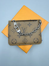 Load image into Gallery viewer, Louis Vuitton reverse monogram Marelle zip pouch
