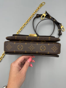 Louis Vuitton East West Pochette metis monogram with strap and chain
