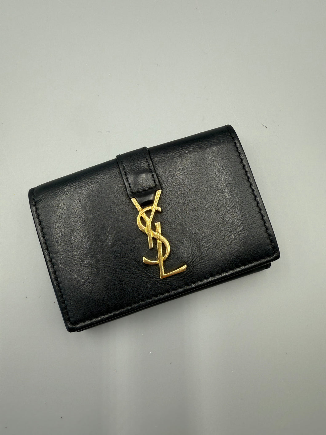YSL trifold black leather snap wallet