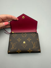 Load image into Gallery viewer, Louis Vuitton Victorine monogram wallet with pink interior