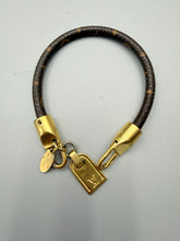 Load image into Gallery viewer, Louis Vuitton monogram bracelet with luggage tag charm