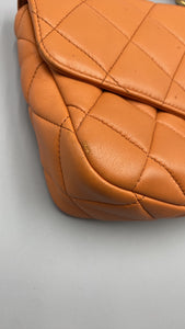 Chanel Orange Lambskin top handle crossbody on chain