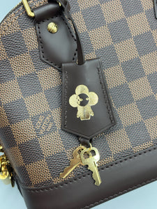 Louis Vuitton Alma BB ebene with strap
