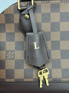 Louis Vuitton Alma BB ebene with strap