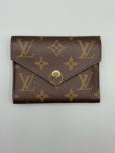 Load image into Gallery viewer, Louis Vuitton Victorine monogram wallet