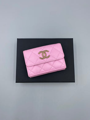 Chanel Pink Caviar compact wallet with mint green interior