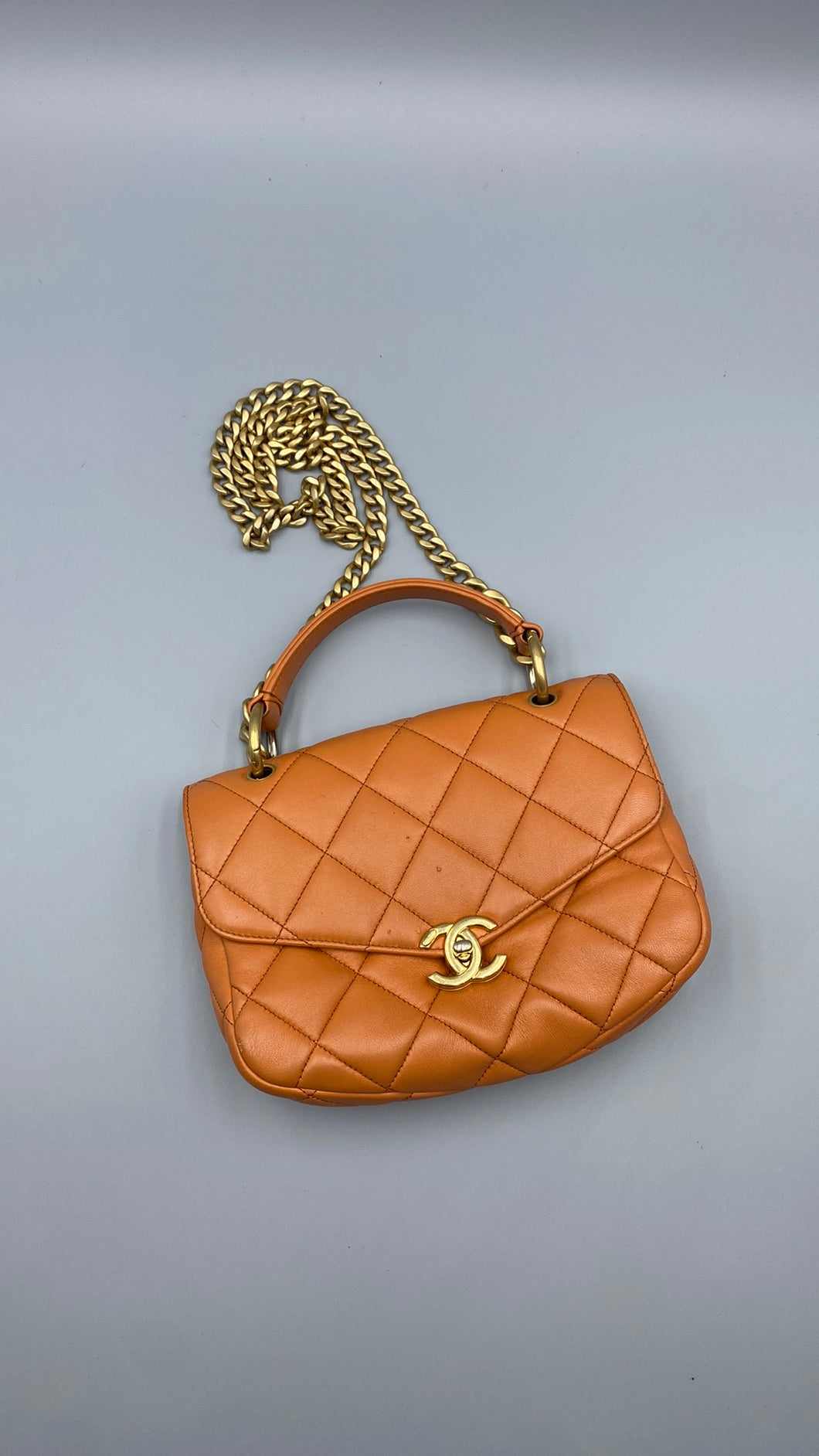 Chanel Orange Lambskin top handle crossbody on chain