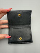 Load image into Gallery viewer, YSL trifold black leather snap wallet