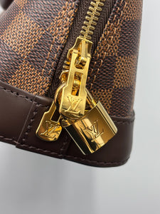 Louis Vuitton Alma BB ebene with strap